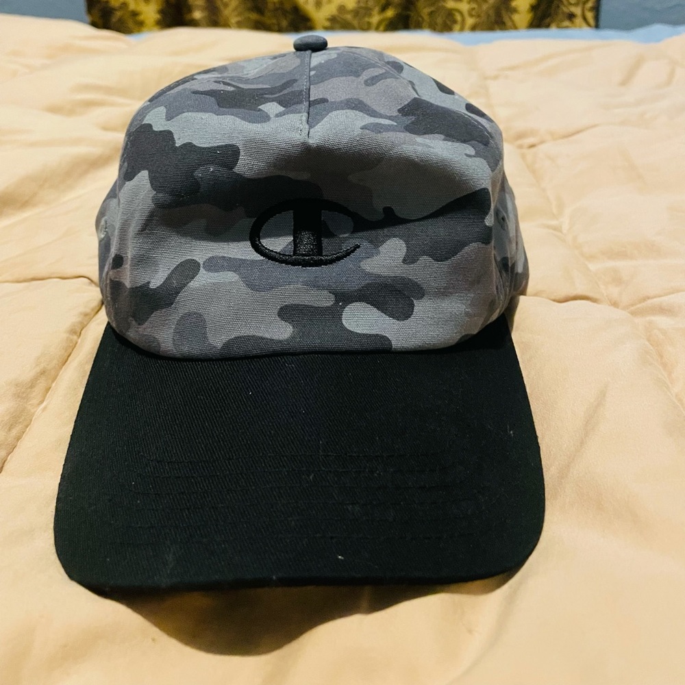 Snap back in worn champion hat.